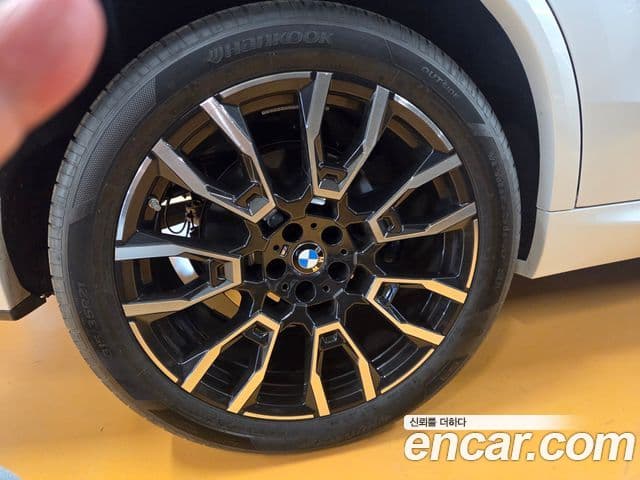 BMW X5 2025 — ფოტო 7/10