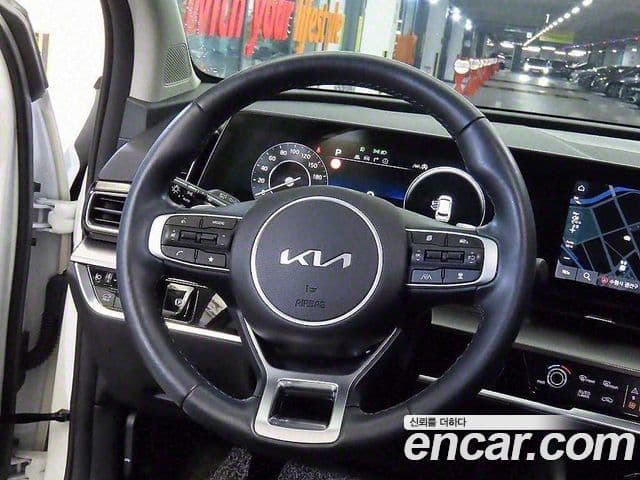 Kia Sportage 2023 — ფოტო 7/20