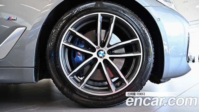 BMW 5 Series 2023 — ფოტო 4/20