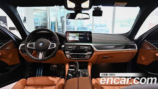 BMW 5 Series 2023 — ფოტო 7/20