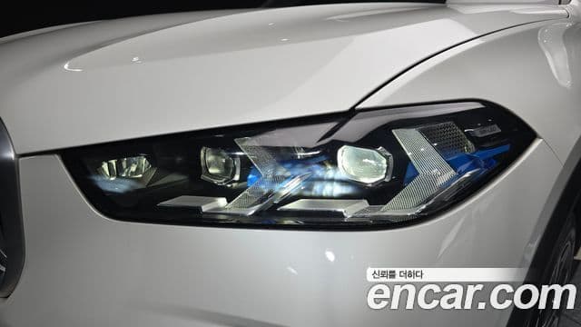 BMW X5 2023 — ფოტო 8/34