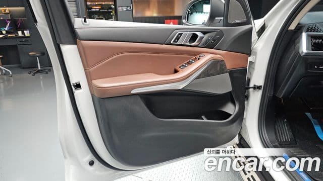 BMW X5 2023 — ფოტო 32/34