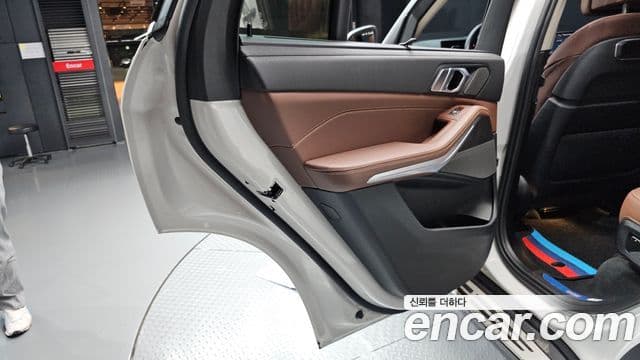 BMW X5 2023 — ფოტო 22/34