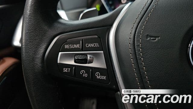 BMW X5 2023 — ფოტო 20/34