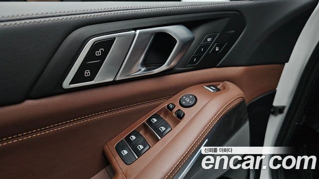 BMW X5 2023 — ფოტო 28/34