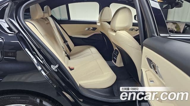 BMW 3 Series 2024 — фото 11 из 20