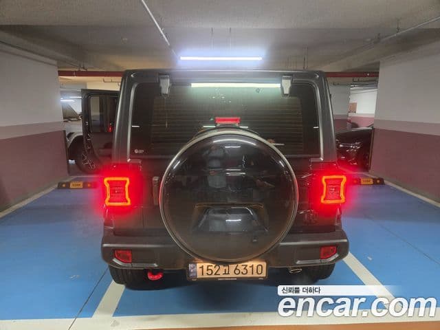 Jeep Wrangler 2021 — ფოტო 9/20