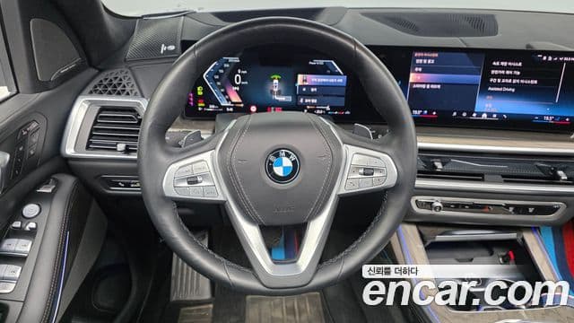 BMW X7 2023 — ფოტო 13/20