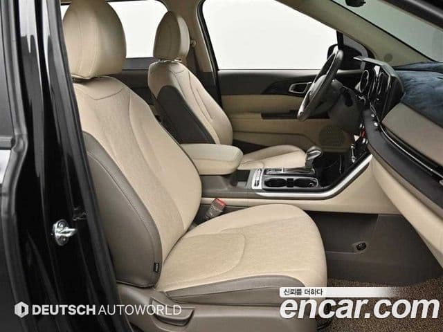 Kia Carnival 2023 — ფოტო 8/20