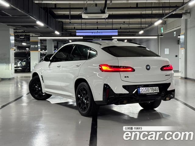 BMW X4 2022 — ფოტო 1/20