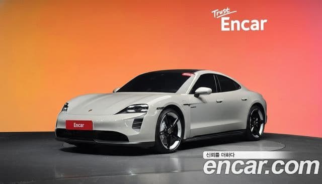 Porsche Taycan 2024 — ფოტო 34/36
