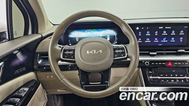 Kia Carnival 2021 — ფოტო 13/20