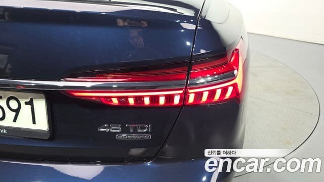 Audi A6 2021 — ფოტო 21/34