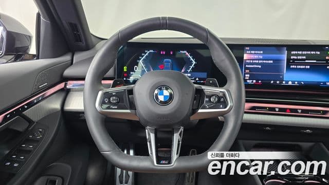 BMW 5 Series 2024 — ფოტო 13/20