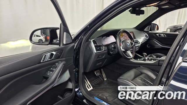 BMW X5 2020 — ფოტო 8/20