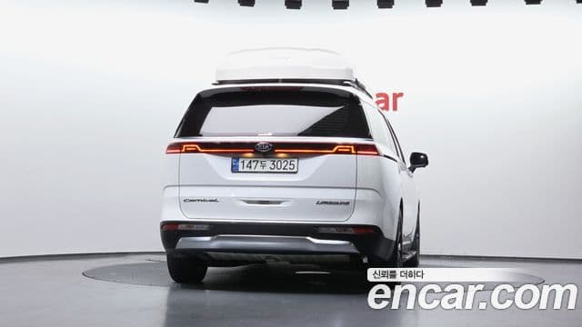 Kia Carnival 2021 — ფოტო 4/20