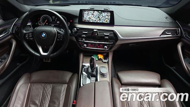BMW 5 Series 2018 — Фото 7/20