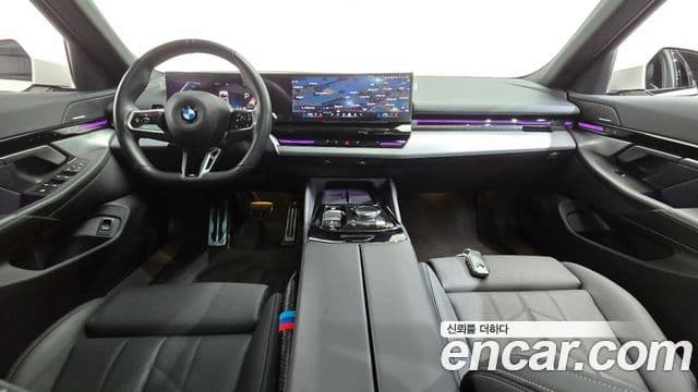 BMW 5 Series 2023 — ფოტო 7/20
