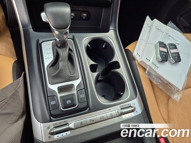 Kia Carnival 2022 — Фото 19/20