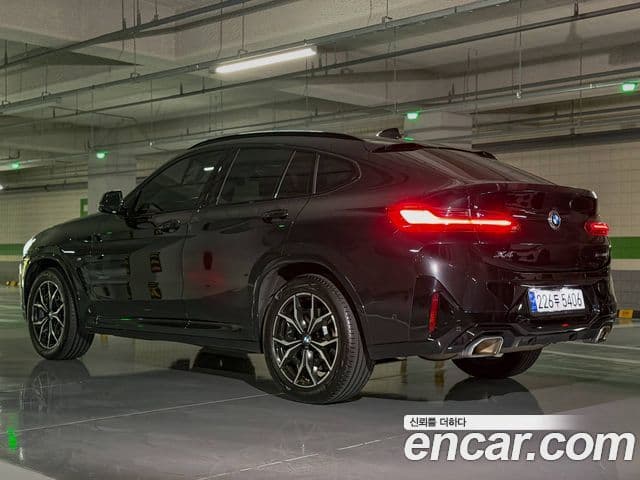 BMW X4 2023 — Фото 2/9