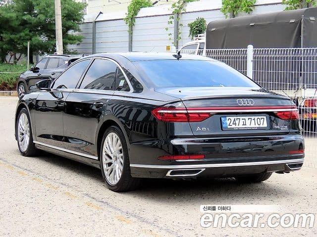 Audi A8 2021 — ფოტო 1/20