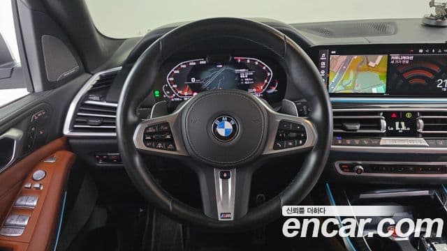 BMW X7 2022 — ფოტო 13/20