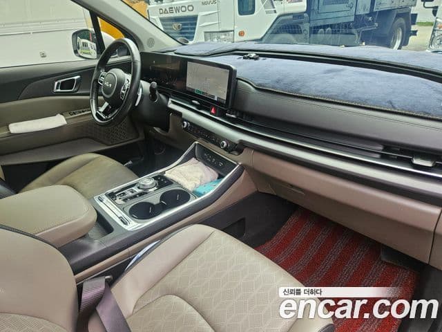 Kia Carnival 2024 — ფოტო 7/13