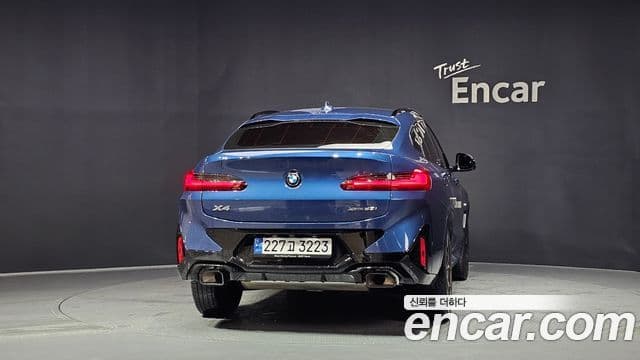BMW X4 2023 — ფოტო 4/20