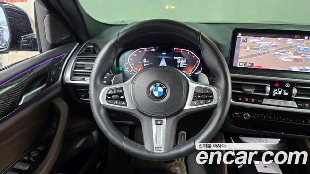 BMW X4 2023 — ფოტო 13/20