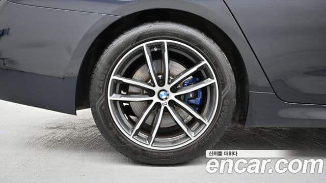 BMW 5 Series 2023 — ფოტო 4/20