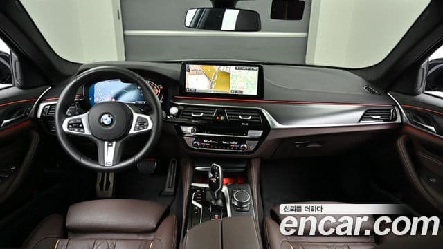 BMW 5 Series 2023 — ფოტო 10/20