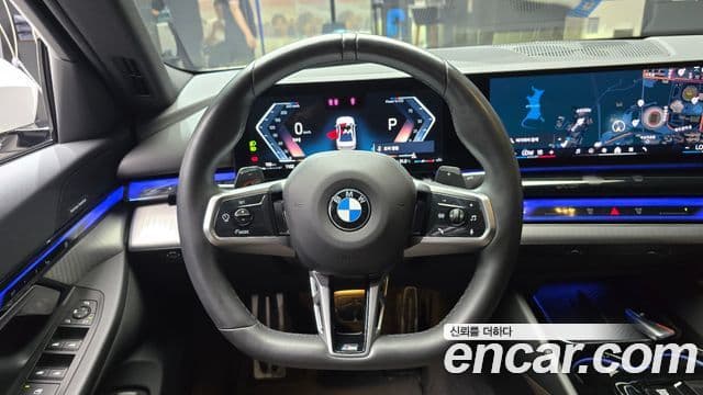 BMW 5 Series 2024 — ფოტო 13/20