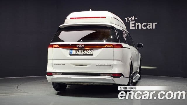 Kia Carnival 2021 — ფოტო 4/20