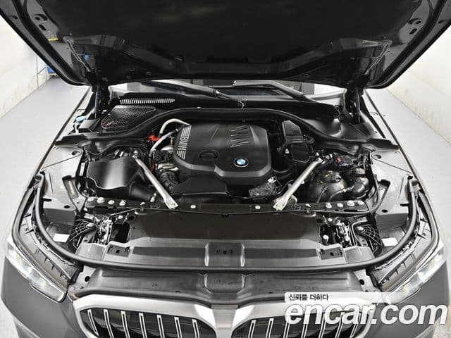 BMW 5 Series 2023 — ფოტო 7/20