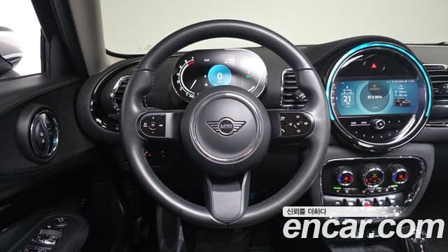 Mini Cooper Clubman 2023 — Фото 12/20