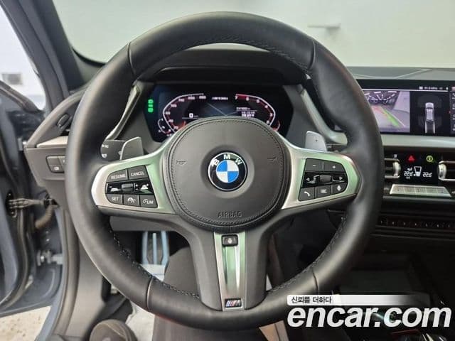 BMW 1 Series 2023 — ფოტო 8/18