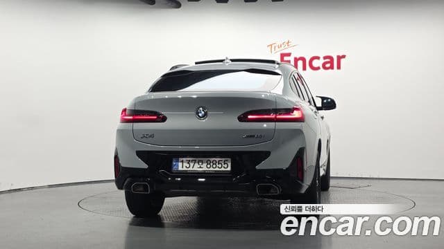 BMW X4 2023 — ფოტო 4/20