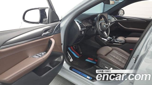 BMW X4 2023 — ფოტო 10/20