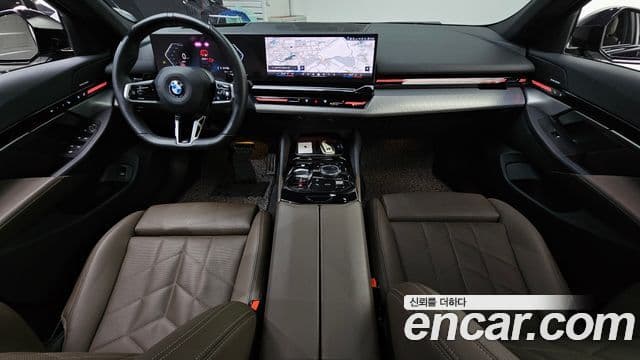 BMW 5 Series 2024 — ფოტო 7/20