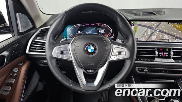 BMW X7 2021 — ფოტო 13/20