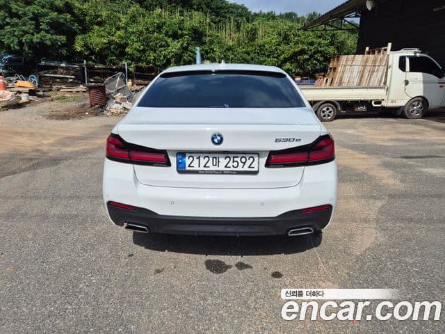 BMW 5 Series 2023 — ფოტო 1/14