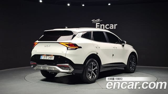 Kia Sportage 2023 — ფოტო 1/20