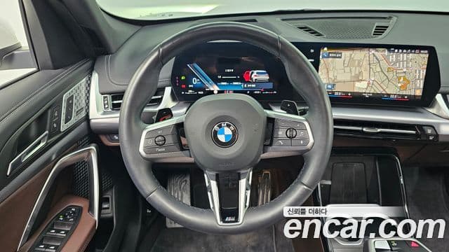 BMW X1 2024 — ფოტო 13/20
