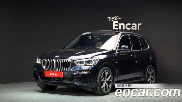 BMW X5 2021 — ფოტო 1/20