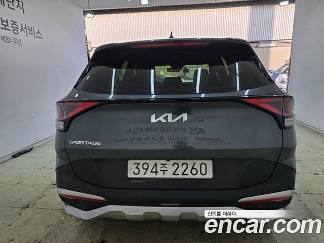 Kia Sportage 2021 — ფოტო 4/16