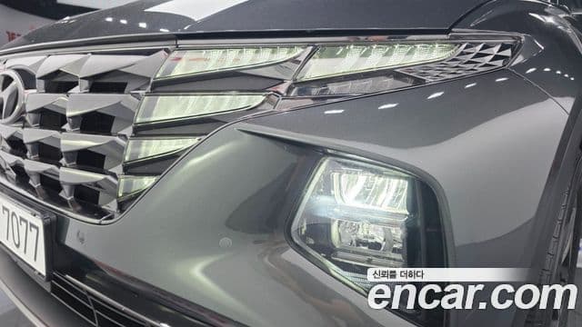 Hyundai Tucson Hybrid 2023 — Photo 2/32