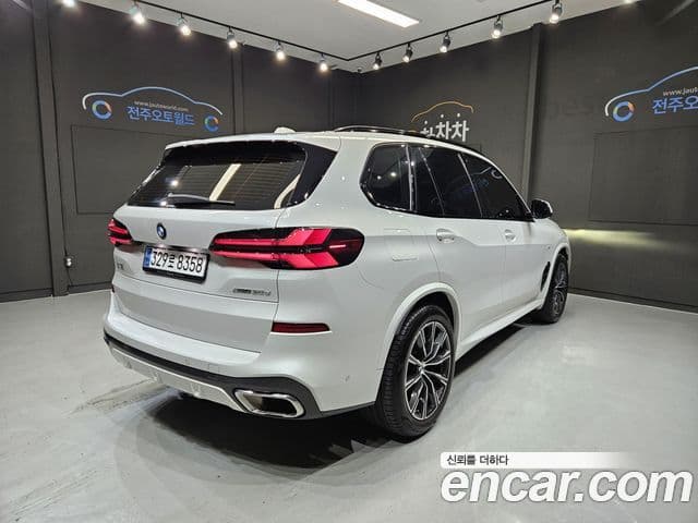 BMW X5 2024 — ფოტო 1/20