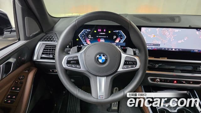 BMW X5 2025 — ფოტო 14/20