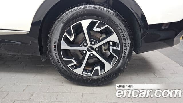 Kia Sportage 2023 — Photo 4/36