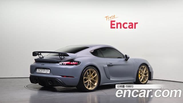Porsche 718 Cayman 2023 — Фото 1/19